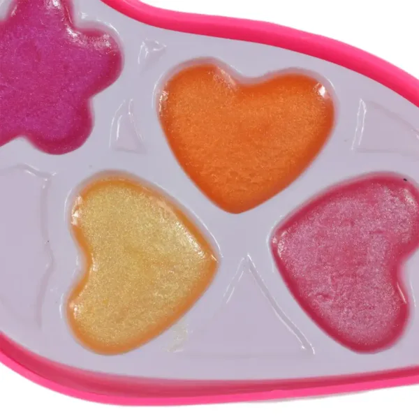 Zestaw Make Up: Paleta do makijażu w kształcie wysokiego obcasa z kremowymi kosmetykami. zdjęcie 6
