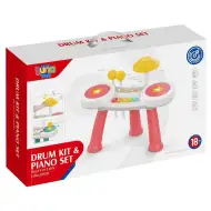 Różowy zestaw perkusyjny z pianinem.