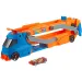 Hot Wheels City: Ciężarówka transportowa z torem wyścigowym i małym samochodem - Mattel