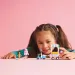 LEGO® Friends: Stoisko z watą cukrową i skuter (42643)